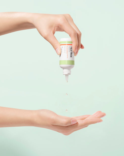 A'PIEU The Pure Tea Tree Essence being dispensed onto a hand