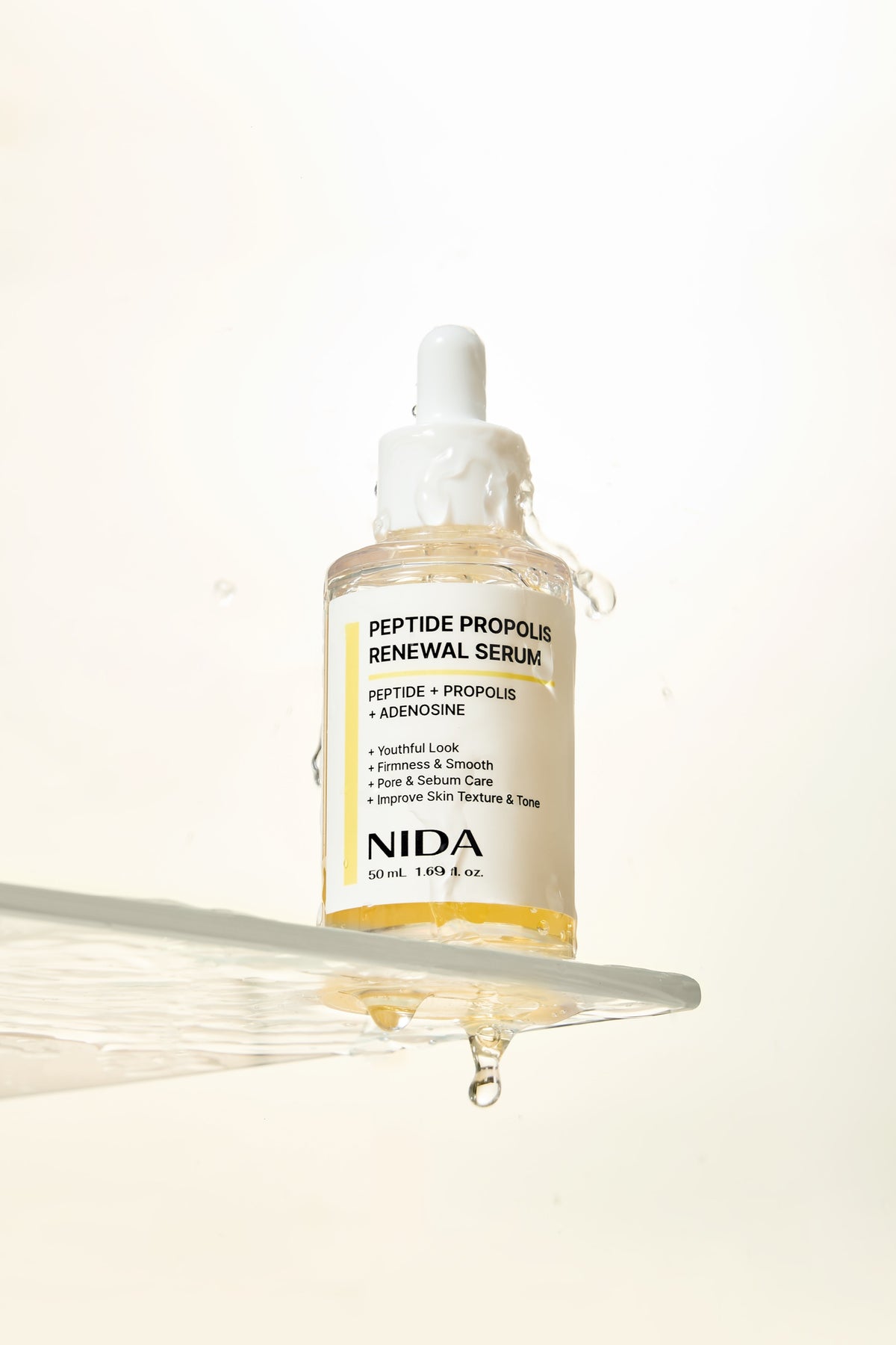 NIDA Peptide Propolis Renewal Serum 50ml — product detail and texture